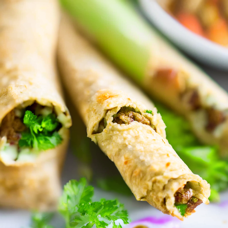 Air Fryer Lamb and Vegetable Spring Rolls with Oven-Baked Cilantro Lime Quinoa lit by natural window light, macro closeup shot filling the frame, manually focused to have razor-sharp clarity throughout the entire dish