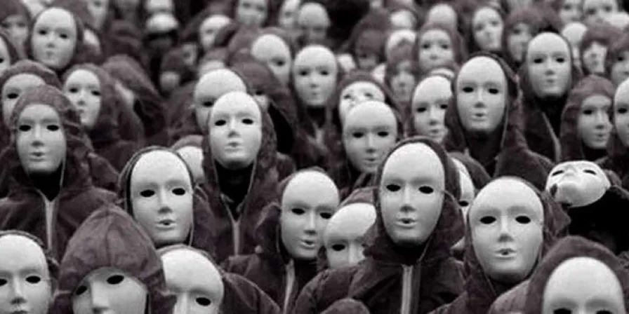 a large group of mannequins with heads in a row