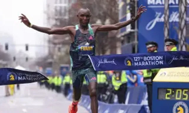 a man running in a marathon in the rain