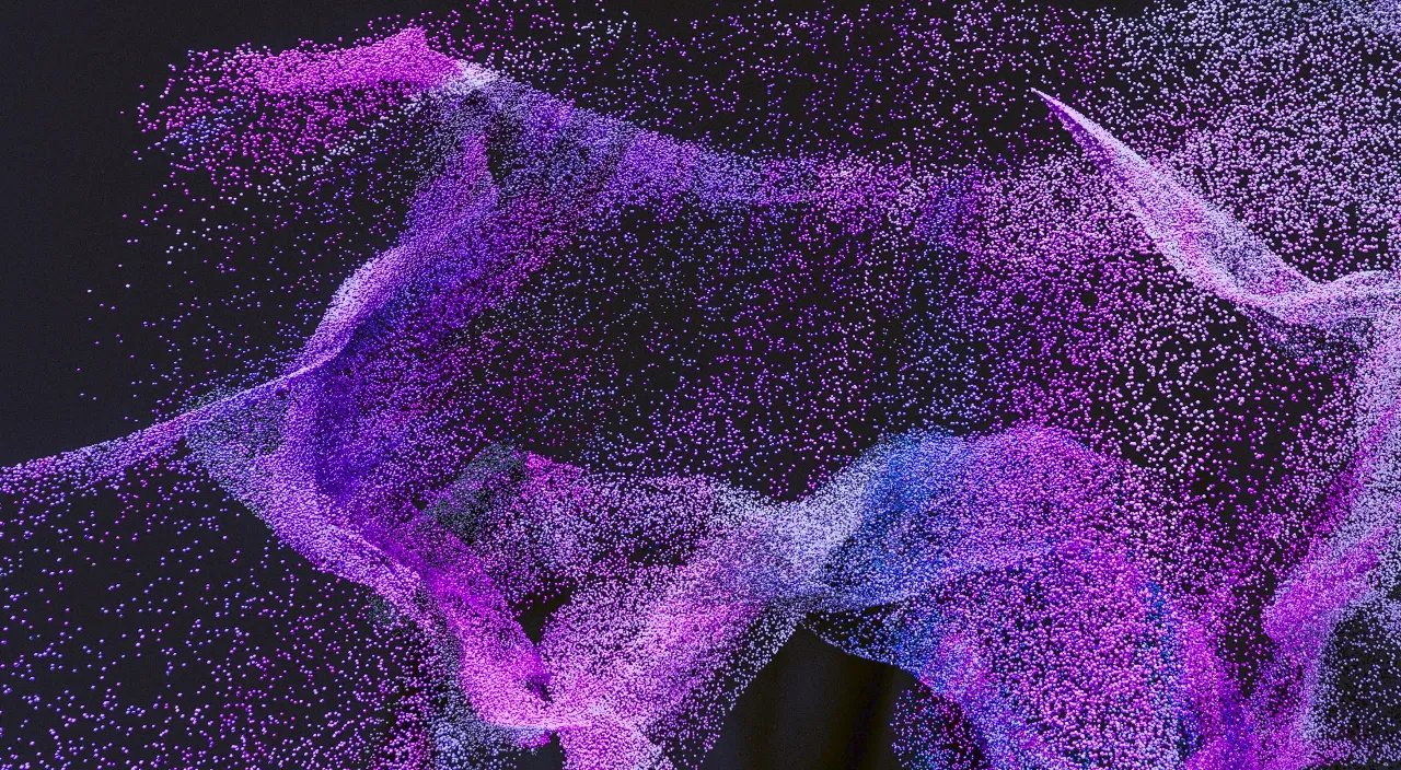 Slow-motion shot of purple ash falling on a light purple surface