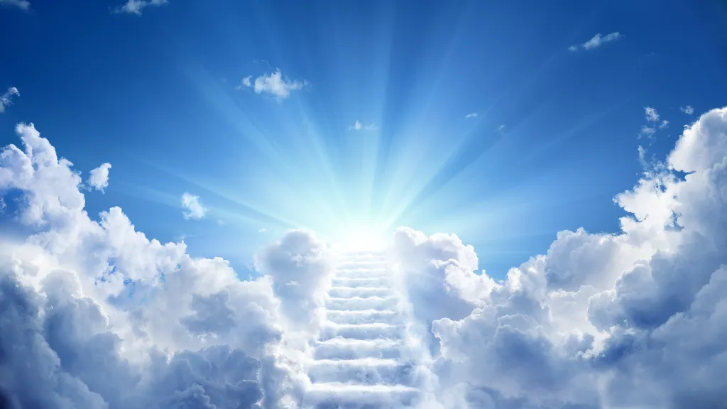 a stairway leading to the sky with clouds