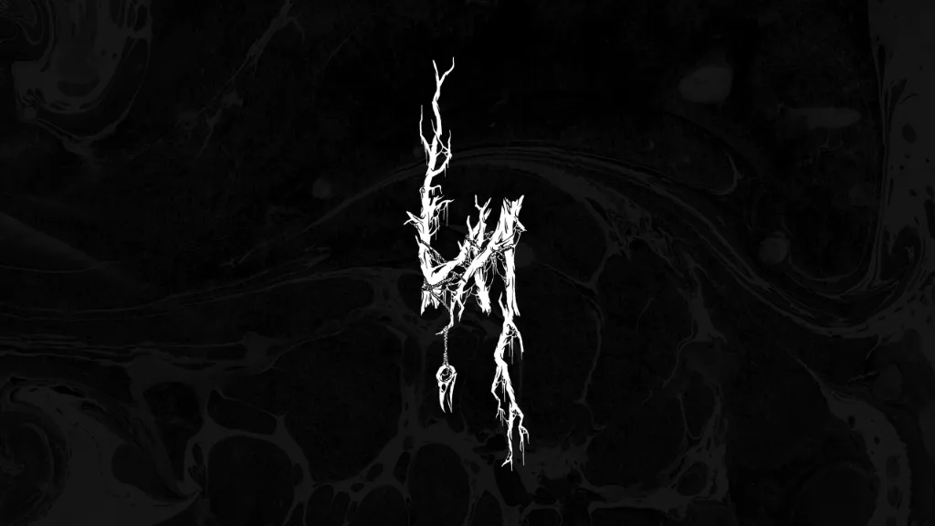 a black and white photo of a tree branch