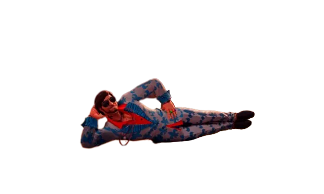 a man laying on the ground in pajamas