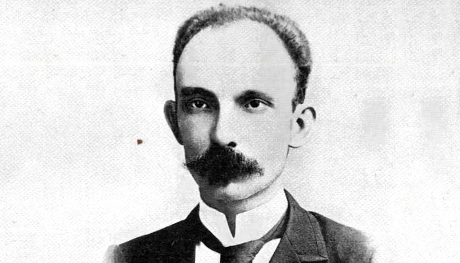 a black and white photo of a man in a suit and tie