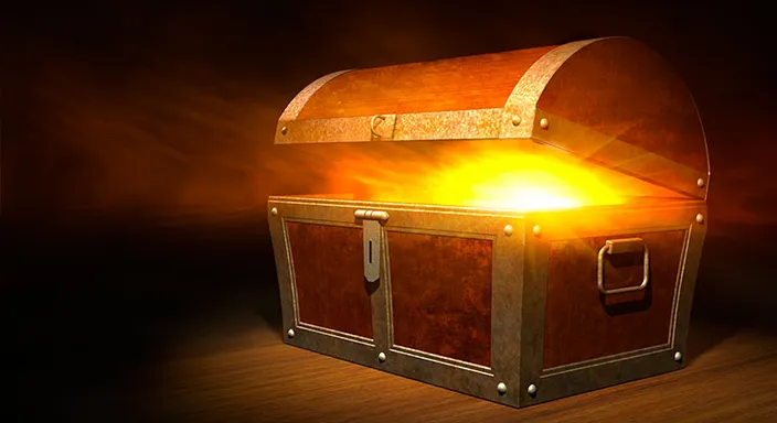 a wooden chest with a glowing light coming out of it