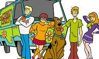 a group of people standing next to a van