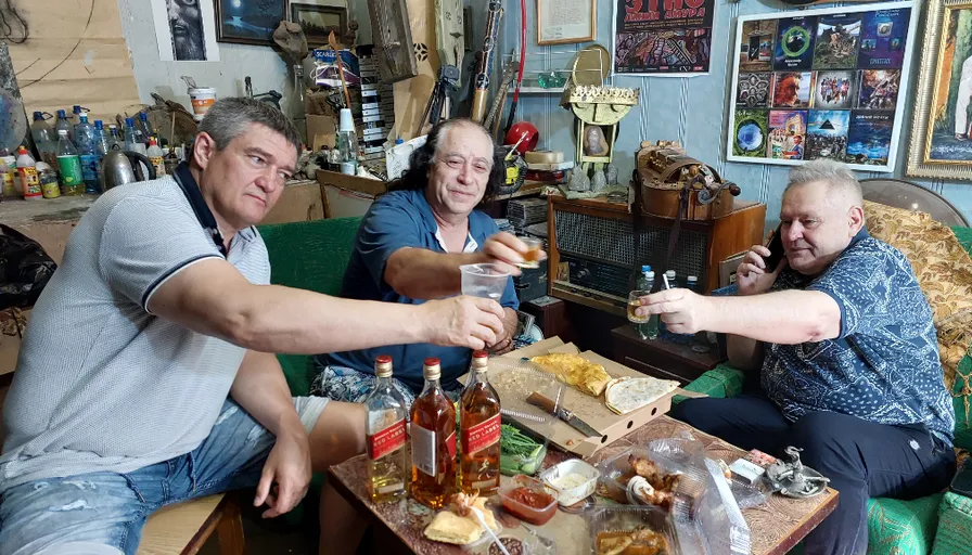 a group of people sitting around a table