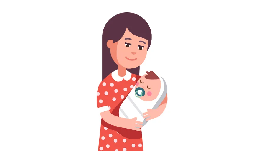 a woman holding a baby in her arms