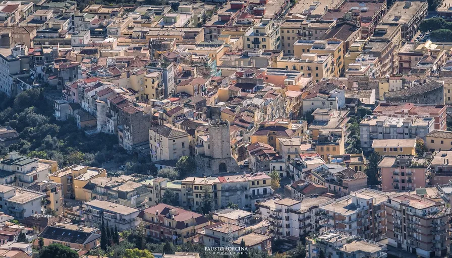 an aerial view of a city with lots of buildings