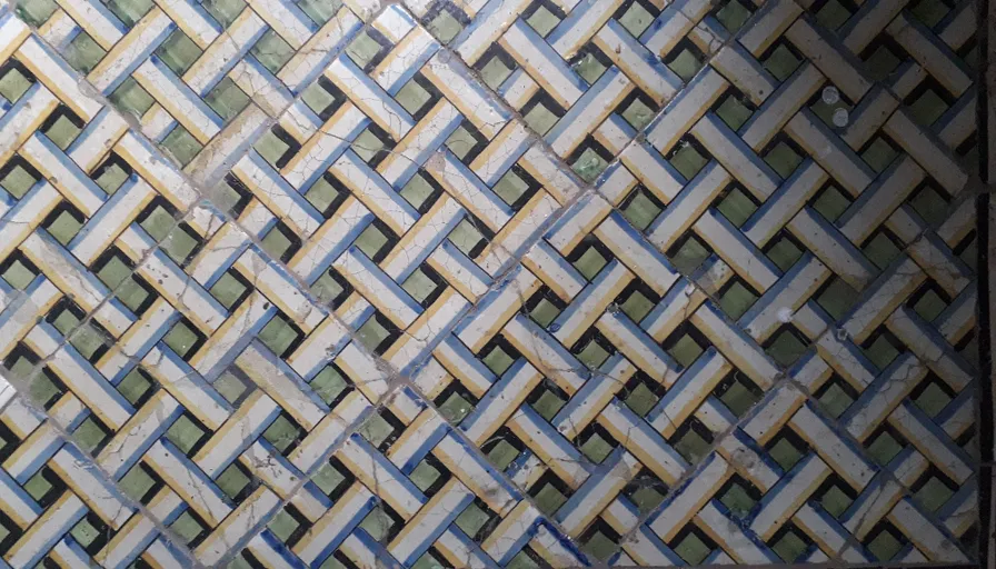 a close up of a wall with a pattern on it