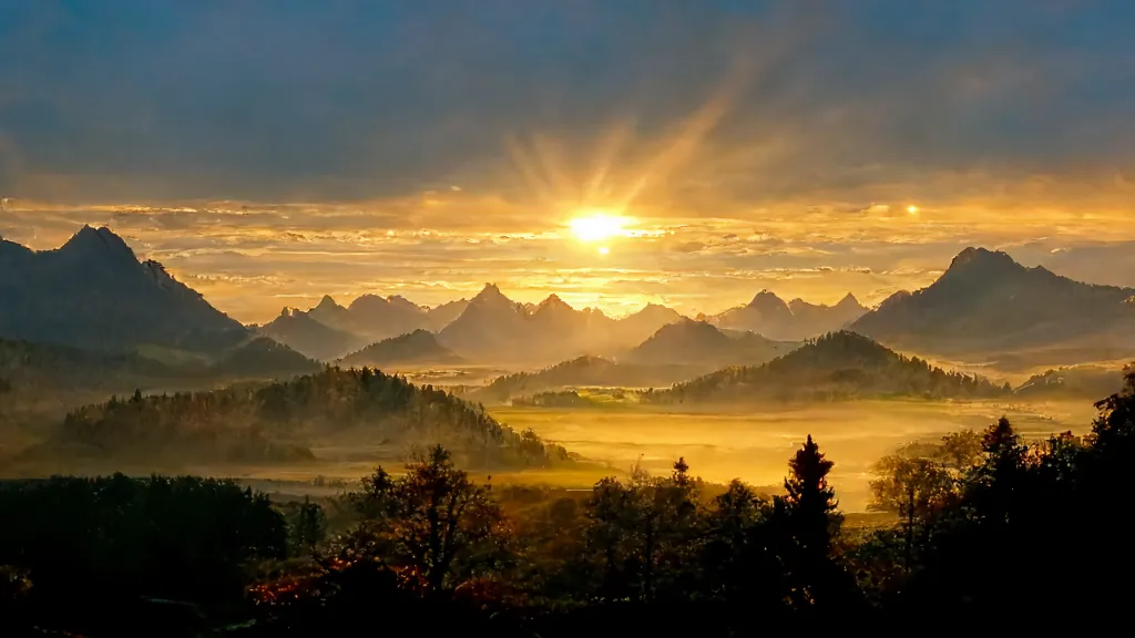 the sun is setting over a mountain range. cloud, sky, mountain, atmosphere, ecoregion, afterglow, tree, natural landscape, dusk, sunlight