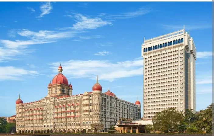 a large building with a red dome on top of it