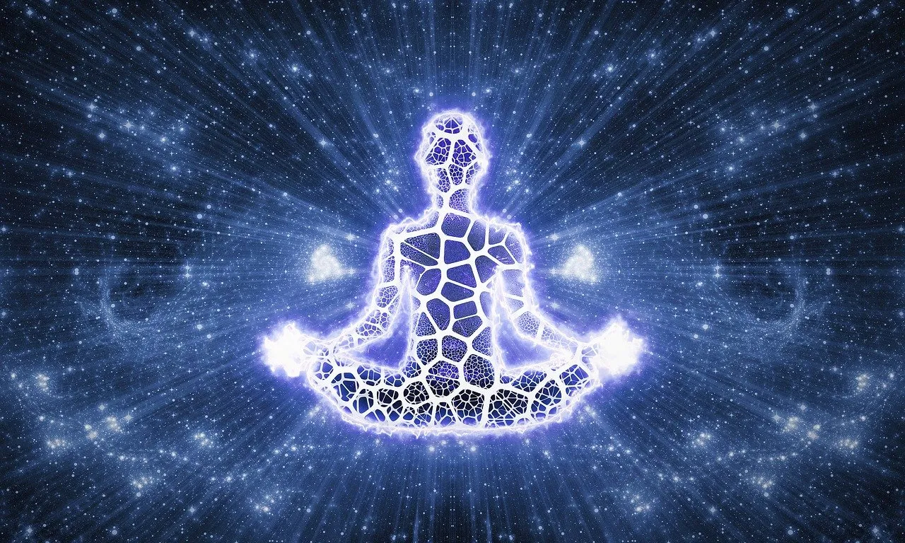 a person sitting in a lotus position surrounded by stars