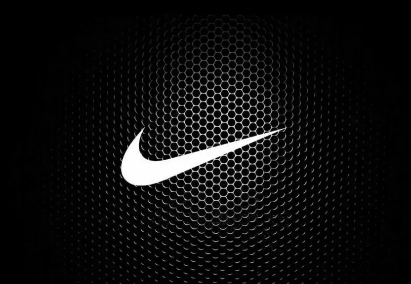 a white nike logo on a black background, white nike pipe liner explodes red and yellow fire