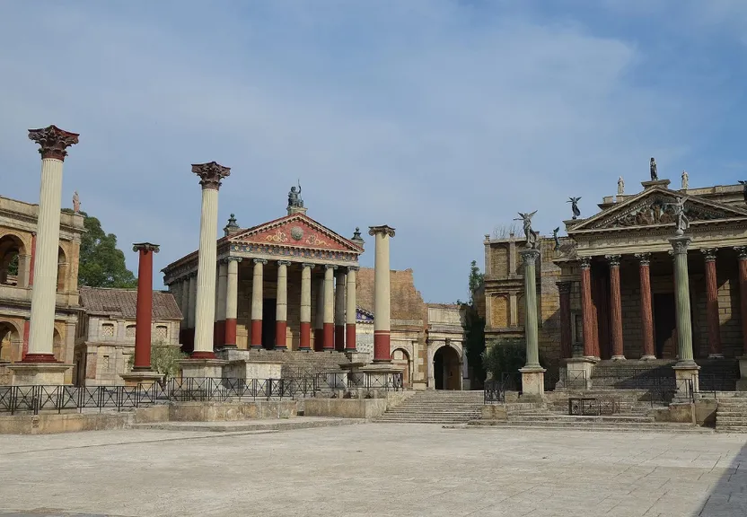 a large building with columns in front of it