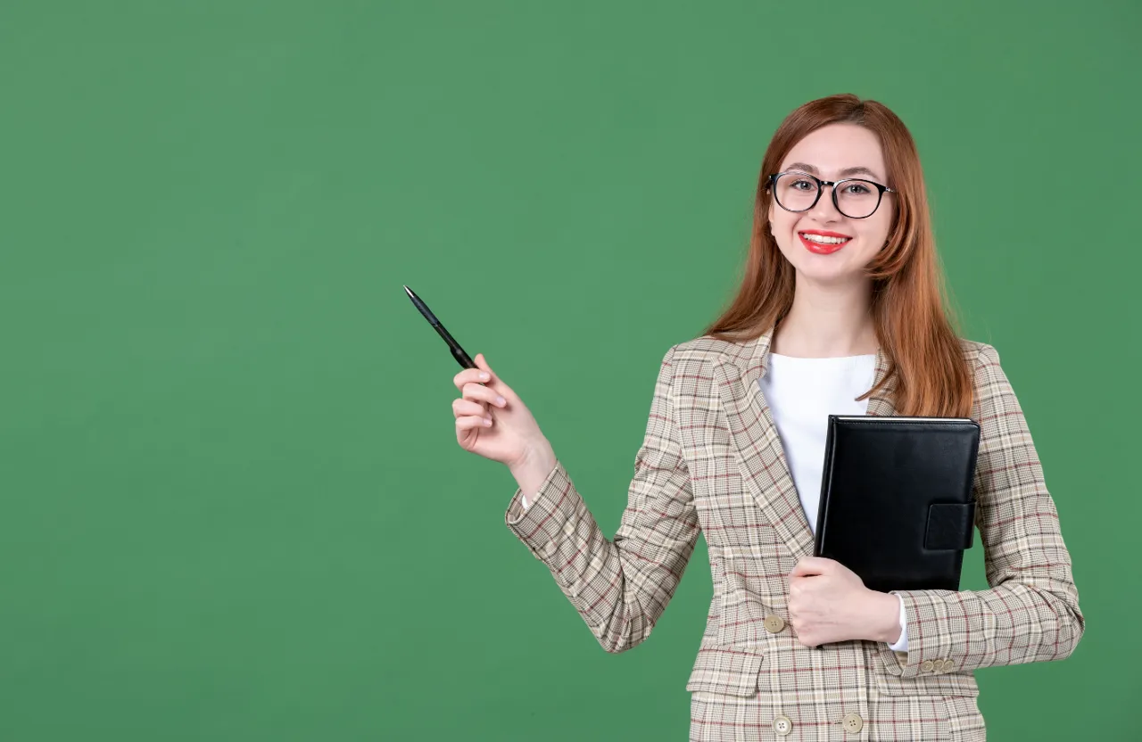 a woman holding pen and file