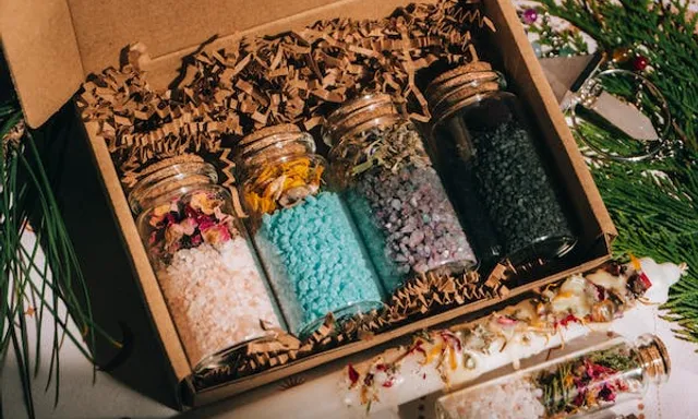 a box filled with lots of different types of confetti. tints and shades, rectangle, art, sweetness, pattern, fashion accessory, ingredient, linens, bangle, souvenir