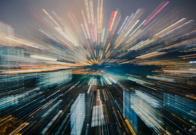 a blurry photo of a city at night