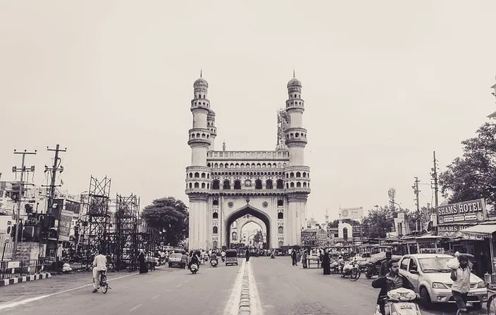 vibrant black and white photo of a city streetscape with vibrant colors added. add vibrant colors