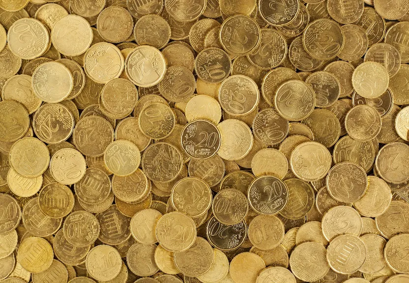 a pile of coins sitting next to each other