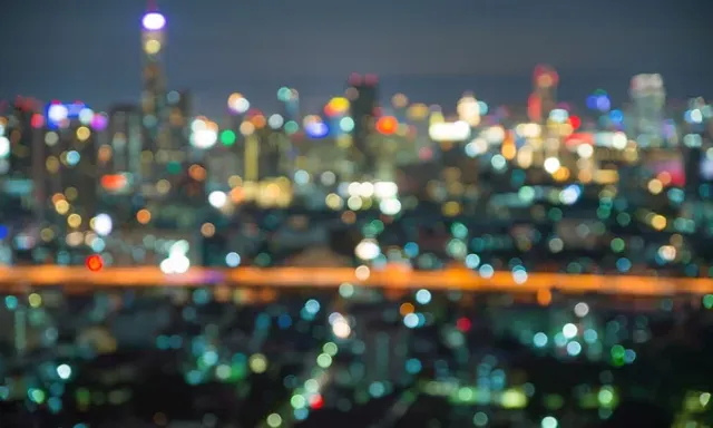 a blurry photo of a city at night