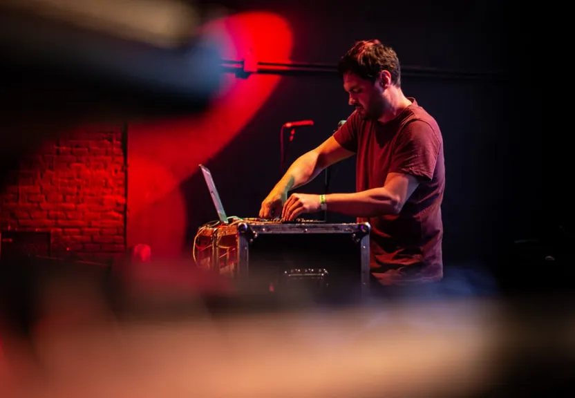 a man that is sitting at a keyboard