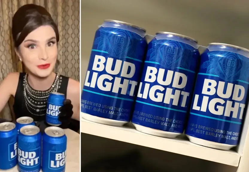 a woman sitting in front of a shelf of bud light cans