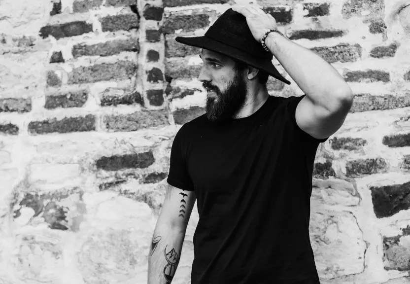 photograph, hat, cap, beard, sleeve, flash photography, standing, black-and-white, fedora, gesture