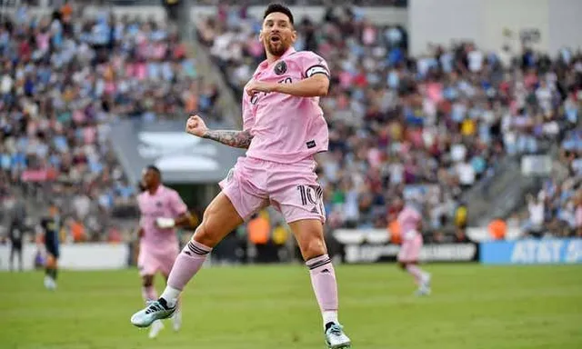 Messi  player in a pink uniform celebrates a goal make him look like Messi celebrating after goal