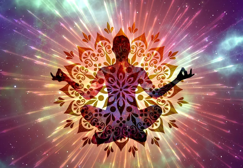 a person in a lotus position surrounded by stars