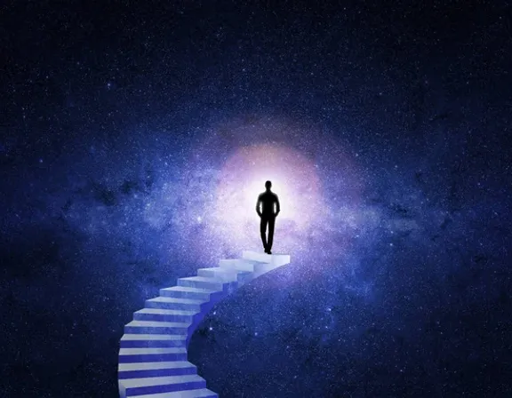 a man walking up a spiral staircase towards the stars