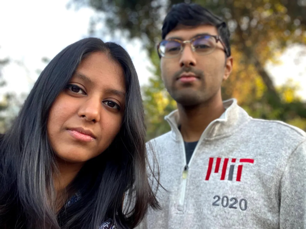 a man and a woman standing next to each other