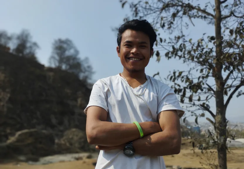 A Man Standing In Front of a Tree, Calm and Protected. clean, sharpen, focus on the man's face