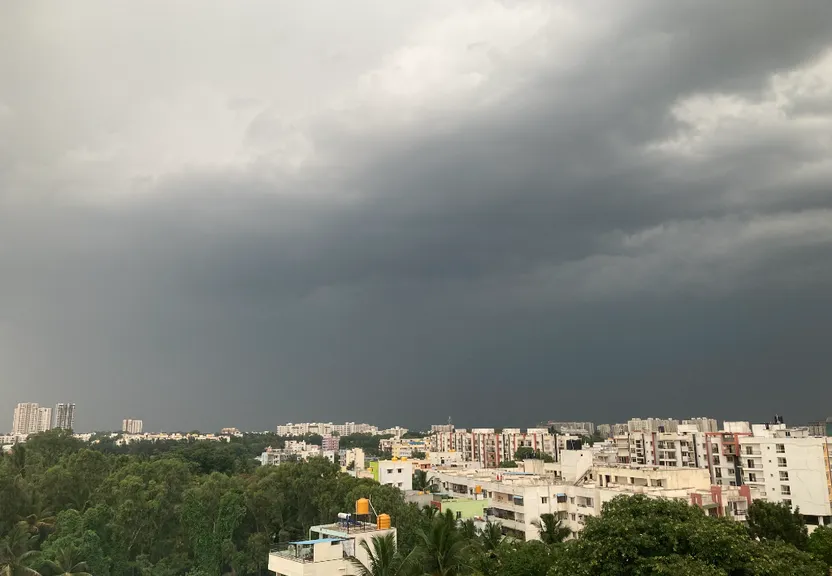 a view of a city under a cloudy sky