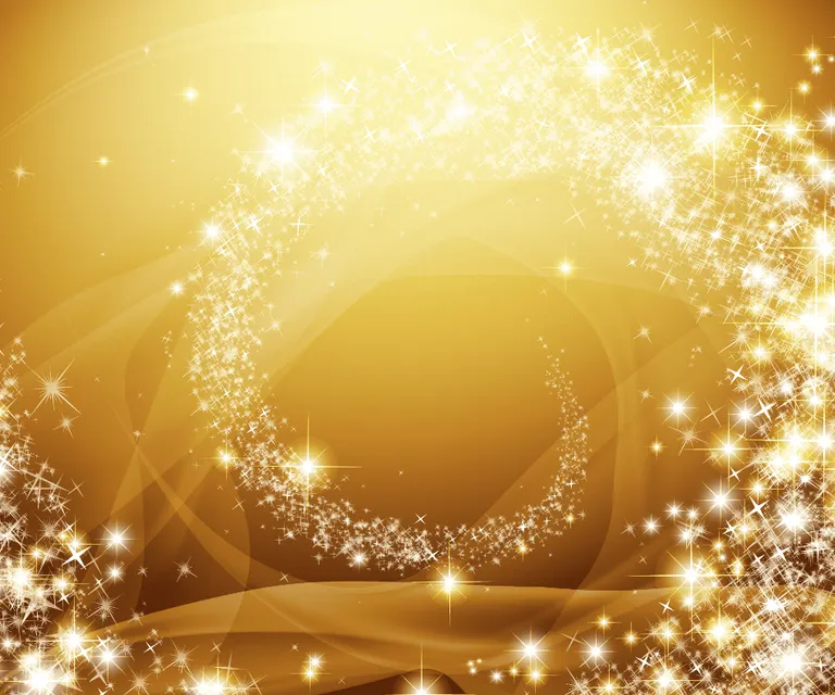 a golden background with stars and sparkles