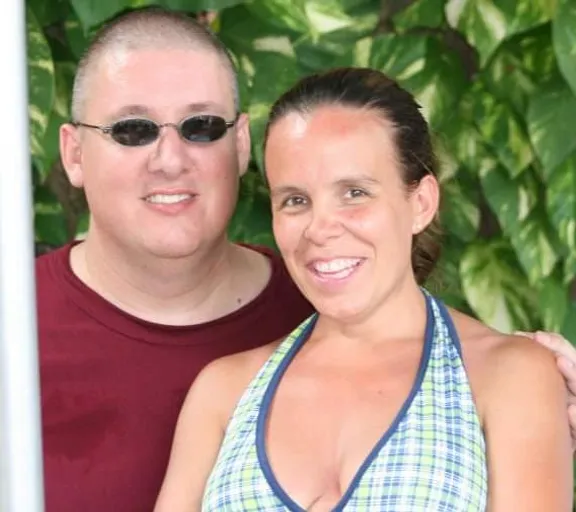 a man and a woman standing next to each other