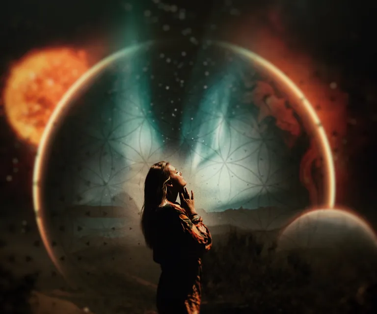 a man standing in front of a solar system talking on a cell phone