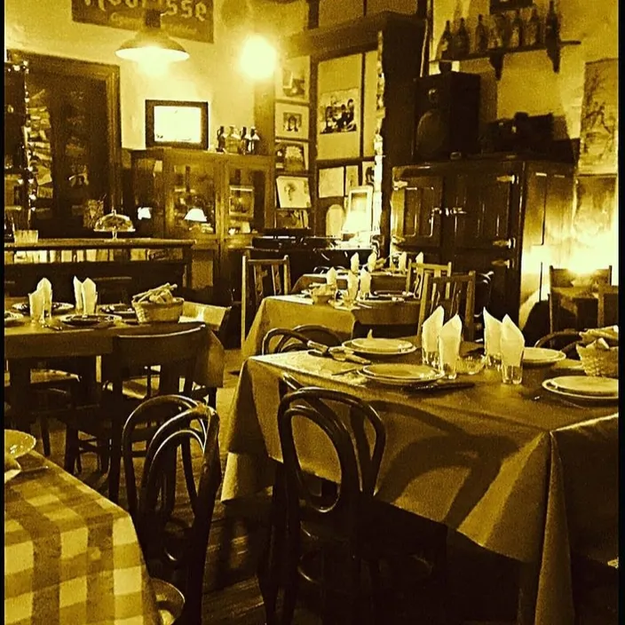a black and white photo of a restaurant