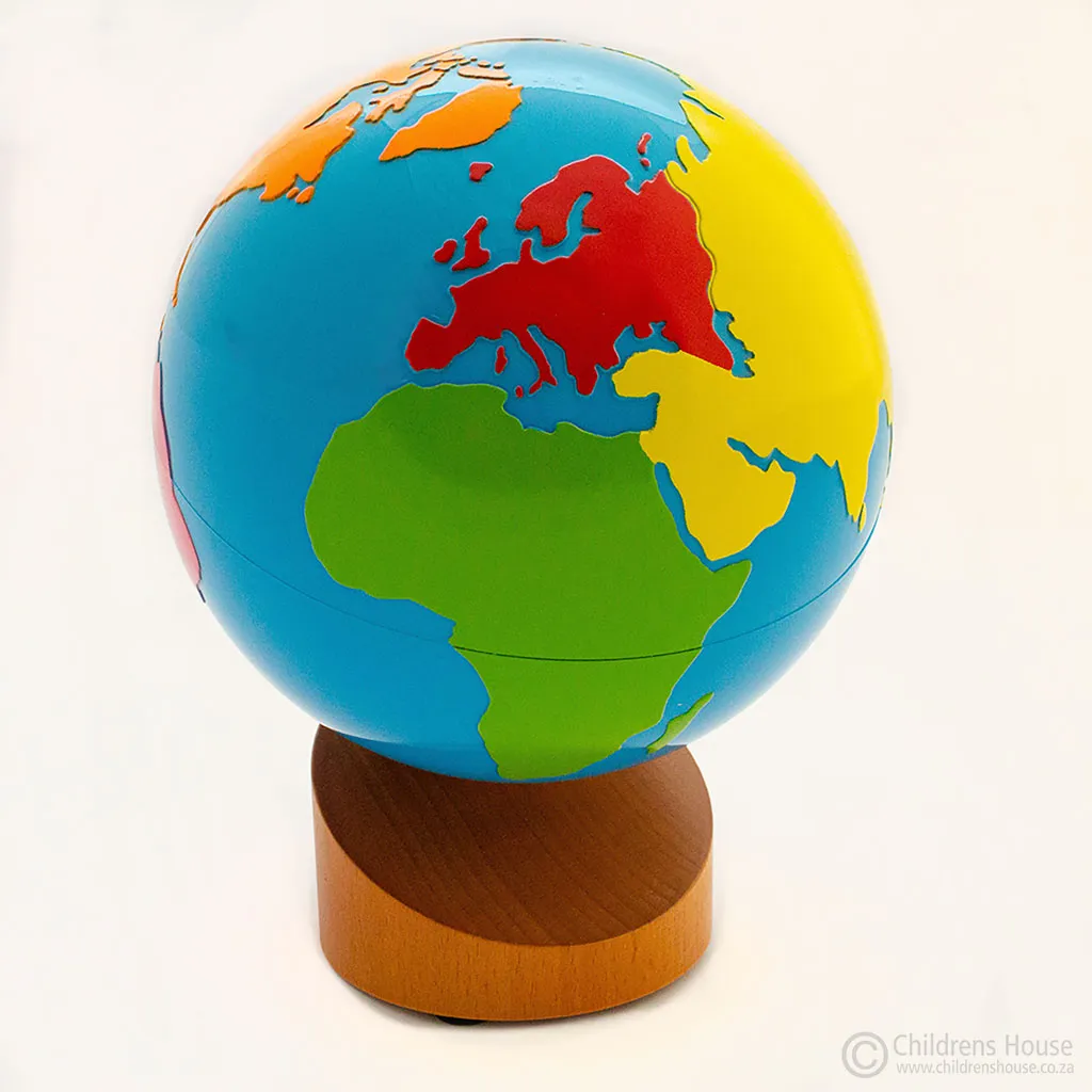 a colorful globe on a wooden stand on a white background dripping paints