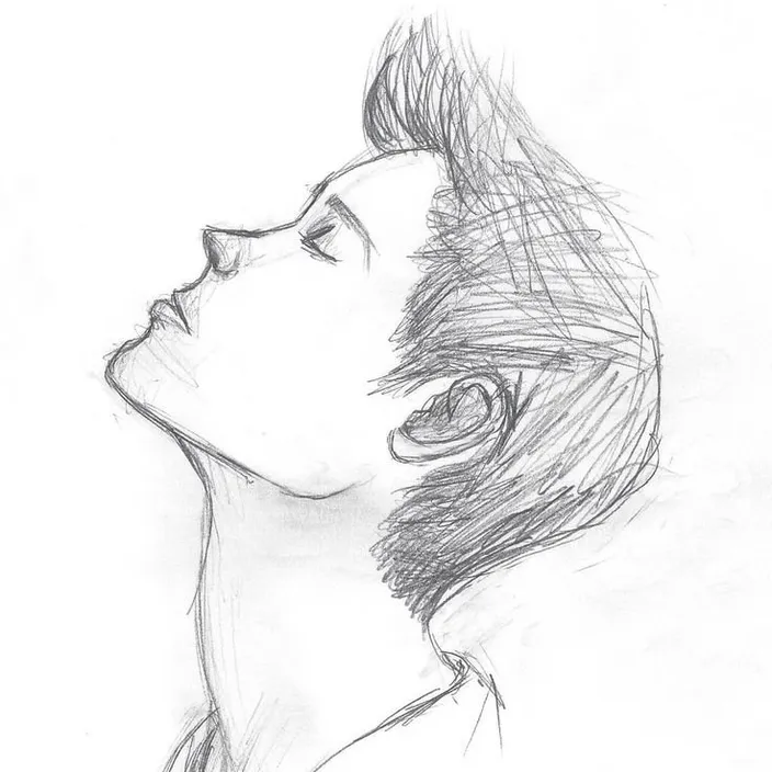 a pencil drawing of a man's profile