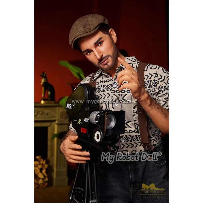 a man holding a camera in front of a fireplace