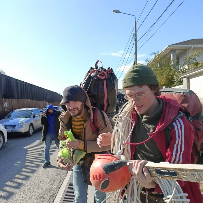 a group of people walking down a street