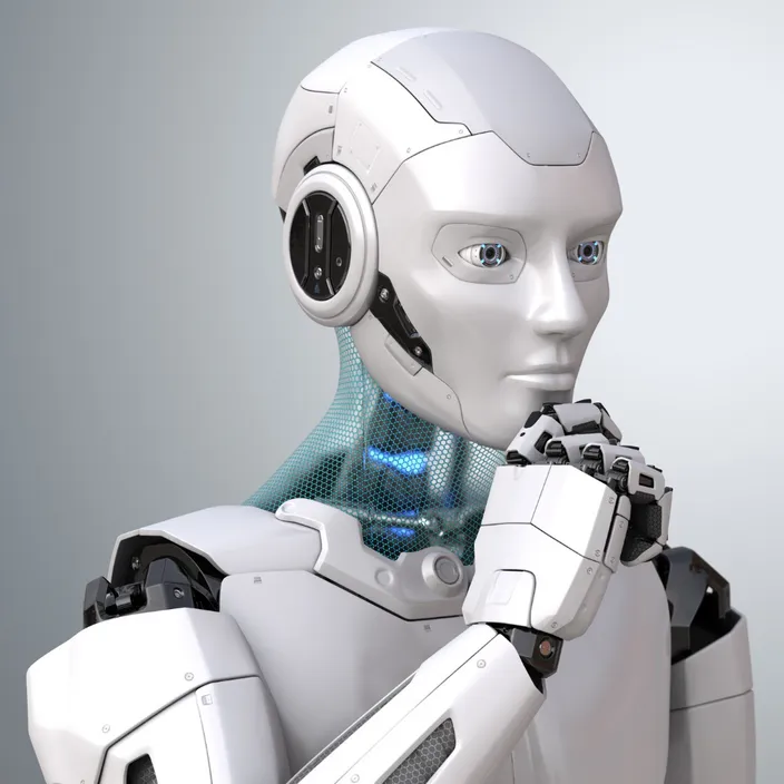 a white robot with headphones on