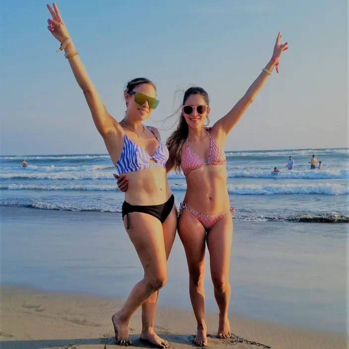 water, sky, glasses, arm, leg, people on beach, swimsuit top, hat, brassiere, sunglasses