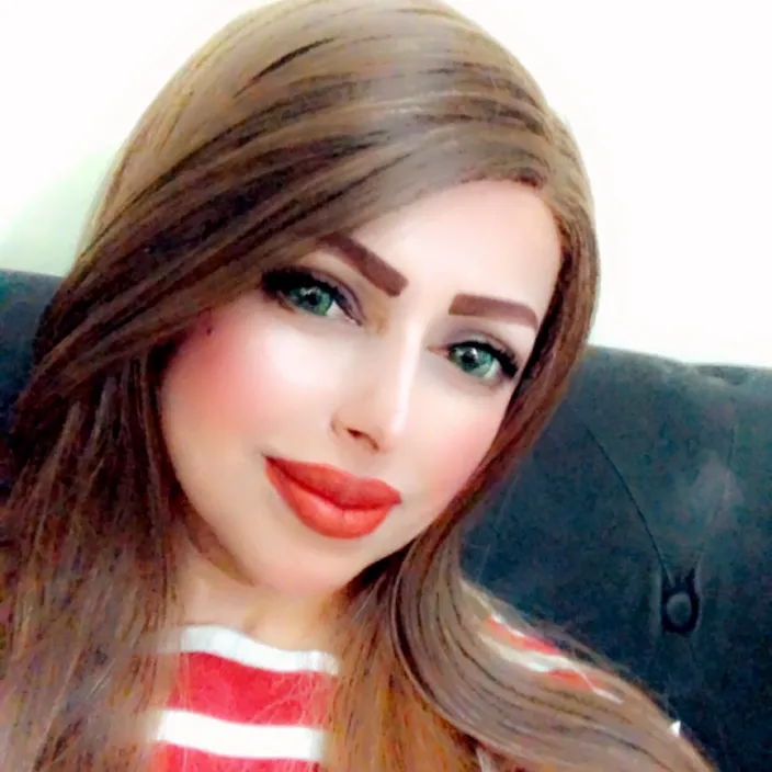 a close up of a woman with long hair