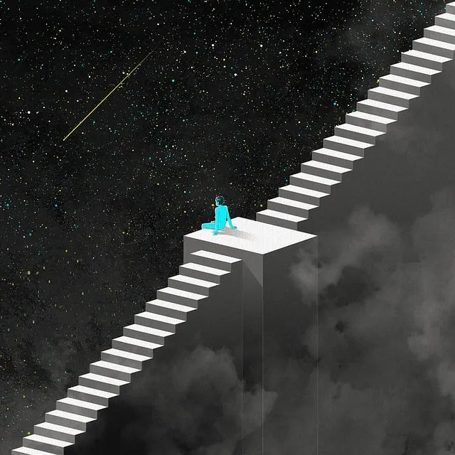 a man sitting on top of a white staircase