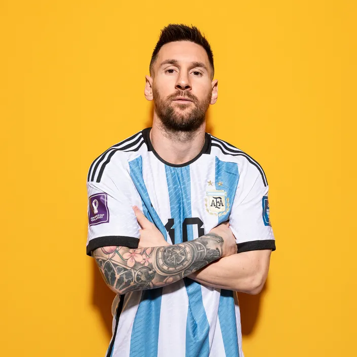 Messi with tattoos standing with his arms crossed make him look like a real Messi footballer