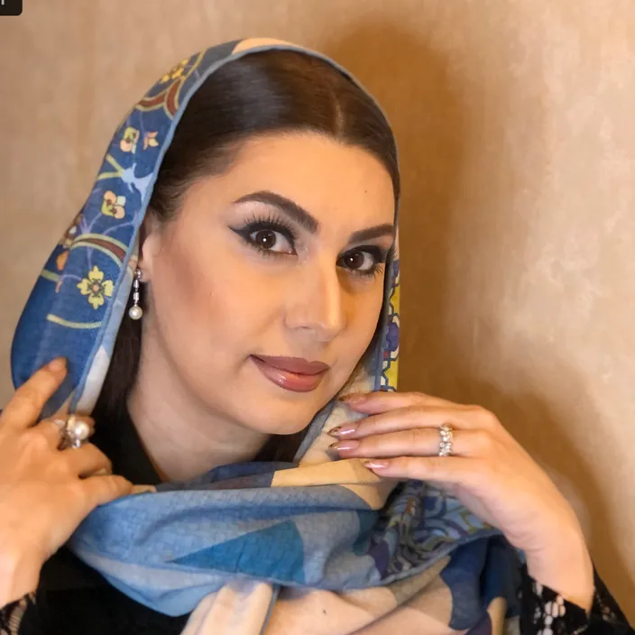 a woman with a scarf around her head