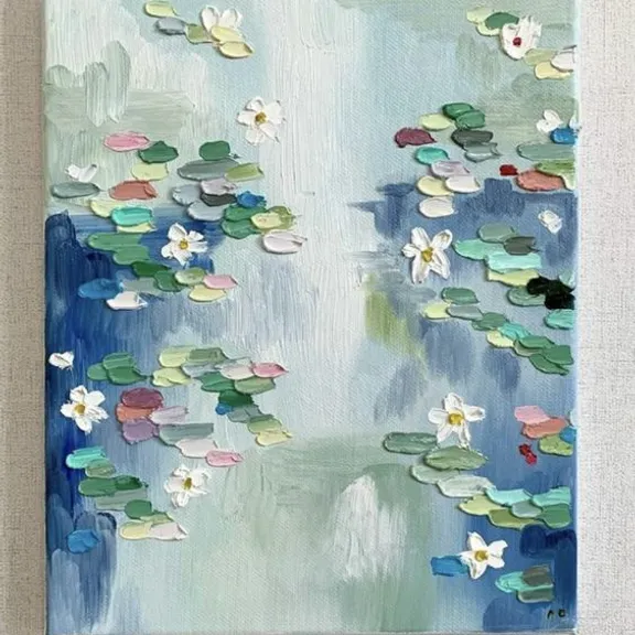a painting of water lilies on a canvas