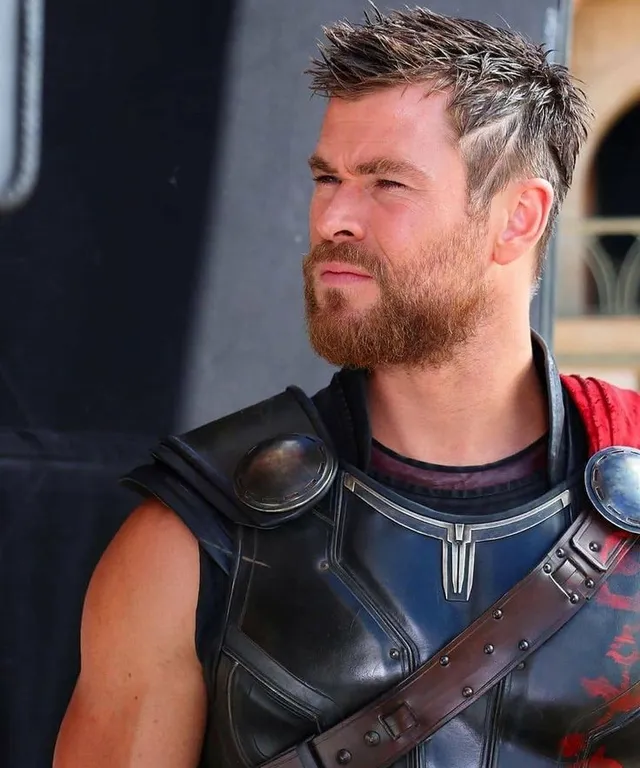a man with a beard wearing a costume